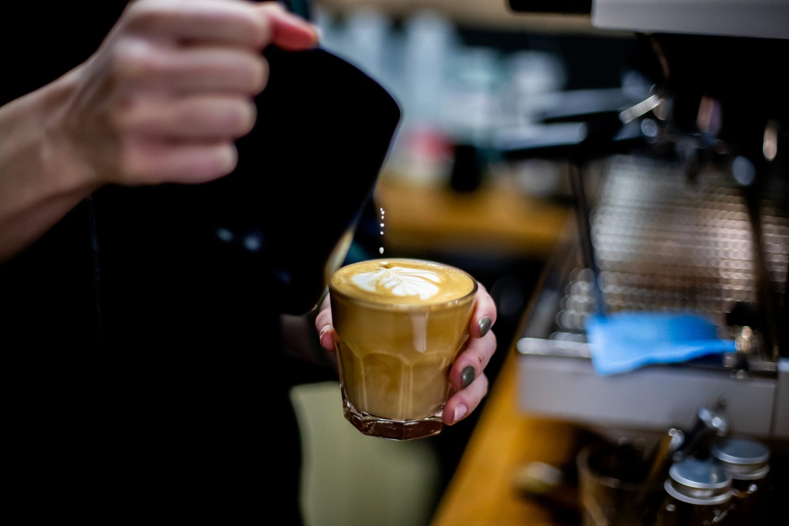 Latte art being poured at The Bee Hive Cafe